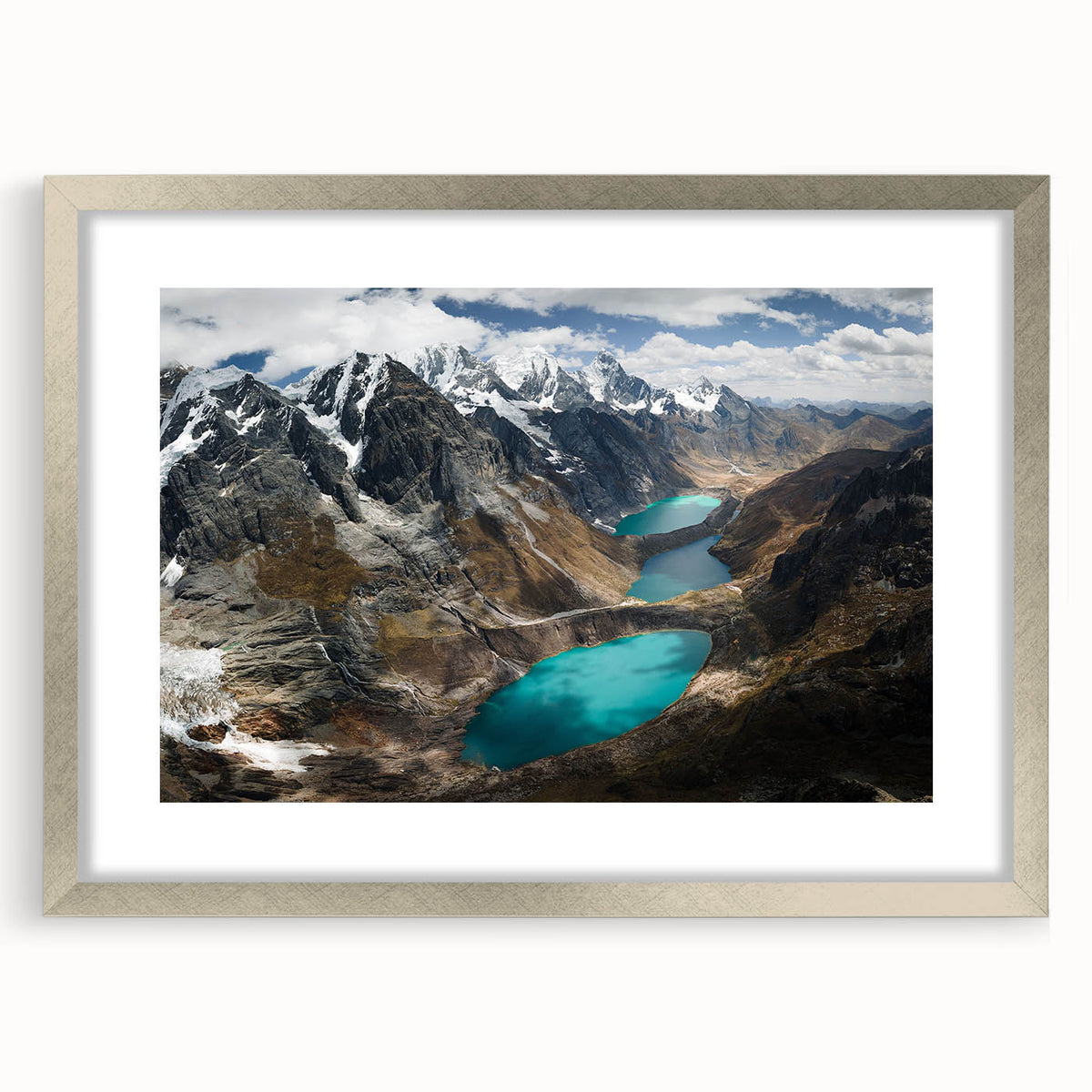 Textured abstract art print of a South American scenery in muted earth tones, framed in silver, ideal for bedroom decor.