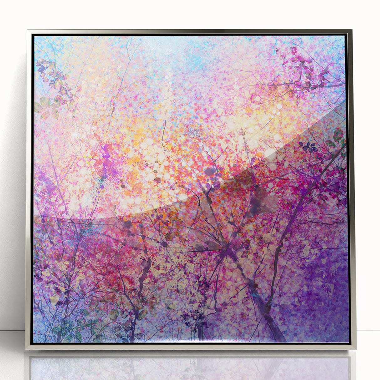 Abstract floral wall art in a sleek silver frame, showcasing vibrant colors and intricate details, ideal for modern home decor. Perfect for adding elegance to any room.