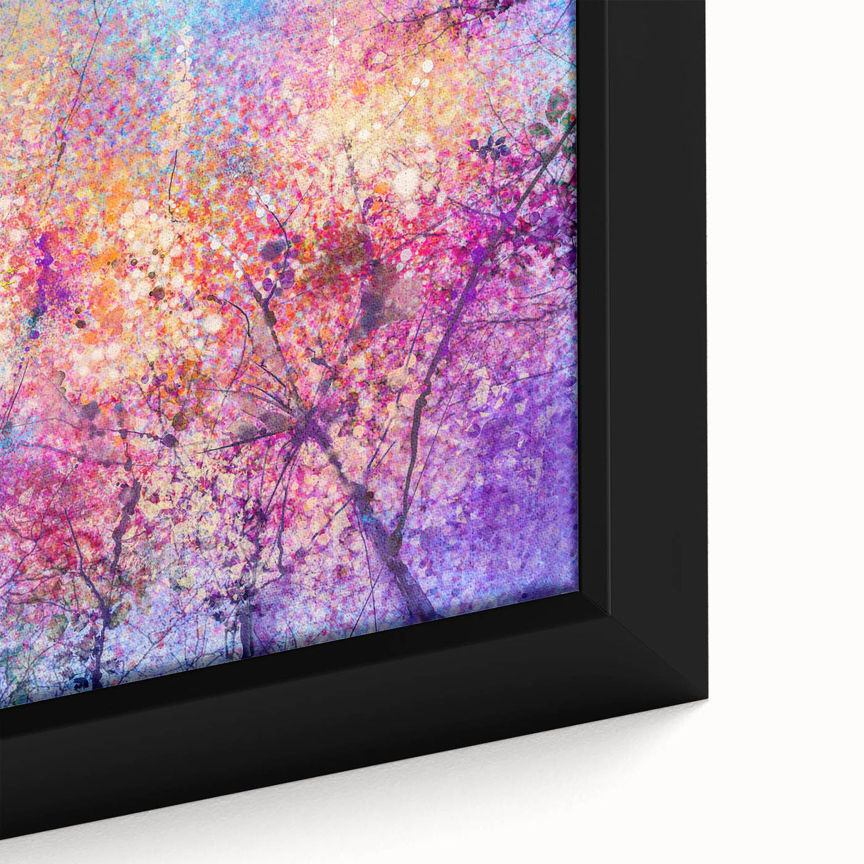 Close-up of a vibrant abstract floral canvas print showcasing bold colors and intricate patterns, elegantly framed, perfect for modern home decor.