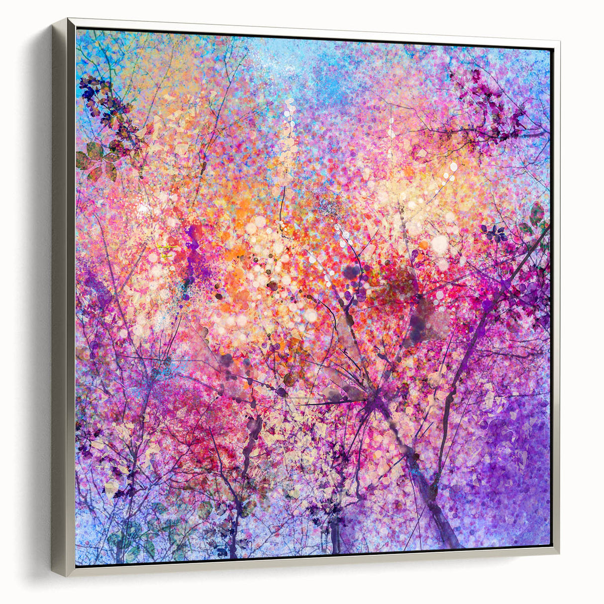 Framed canvas artwork showcasing abstract floral designs in vibrant colors, elegantly displayed from a side view with a sleek silver frame, perfect for home decor.