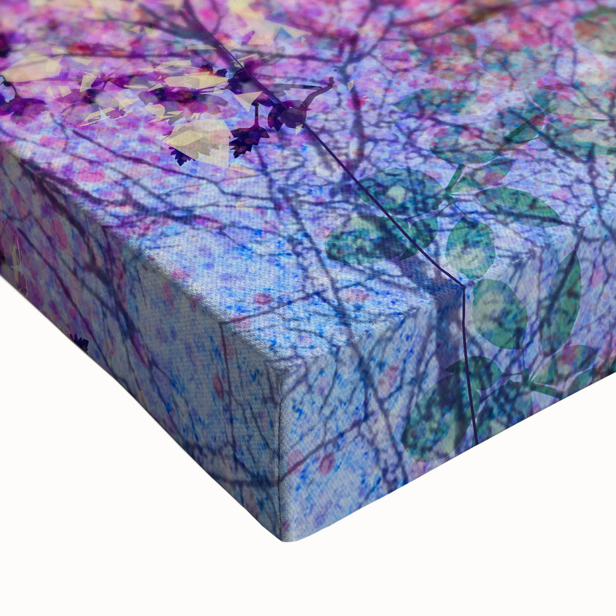 Close-up of an abstract floral stretched canvas displaying vibrant colors and intricate details, perfect for modern home decor and artistic ambiance enhancement.