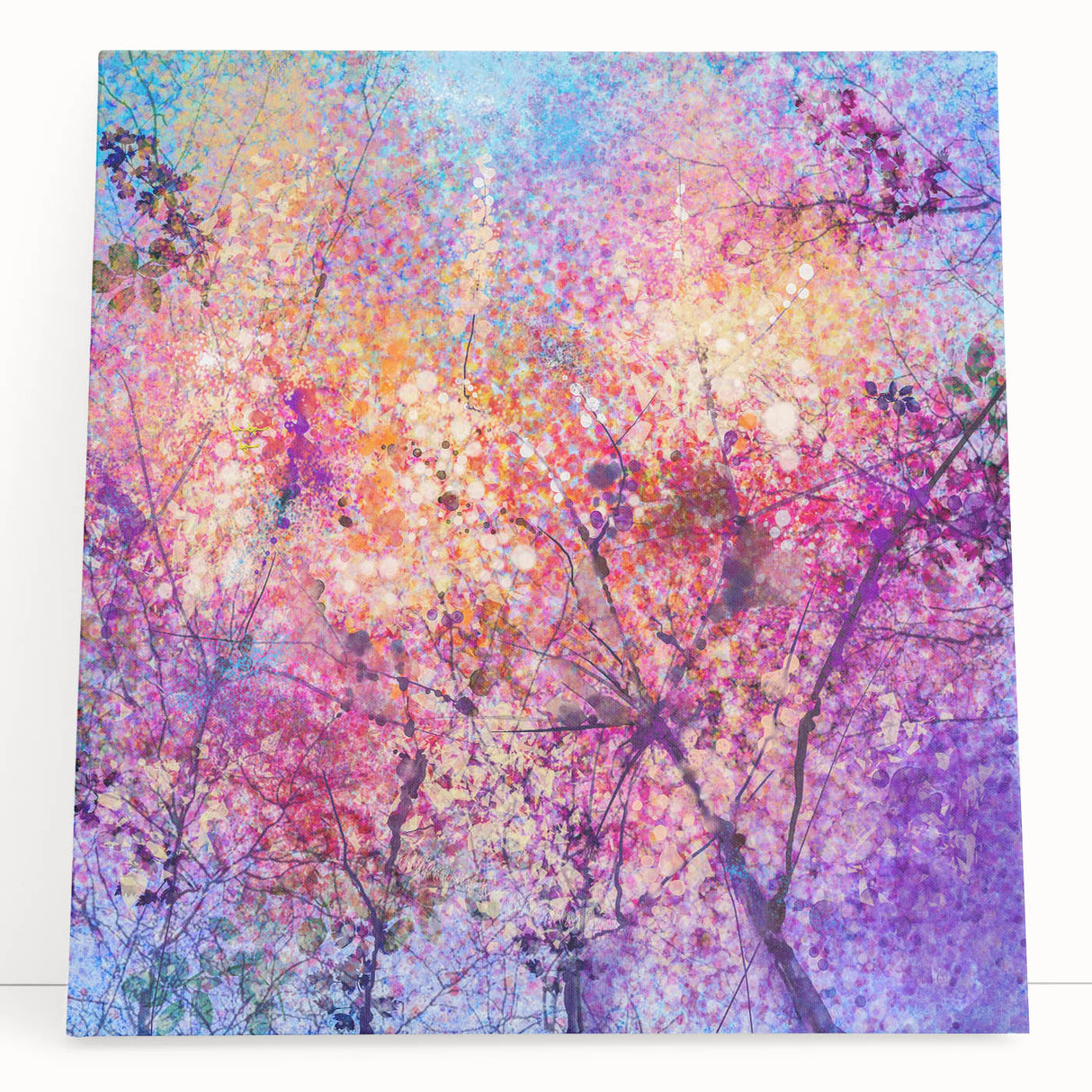 Abstract floral stretched canvas artwork featuring vibrant colors and intricate patterns, elegantly leaning against a wall, perfect for modern home decor.