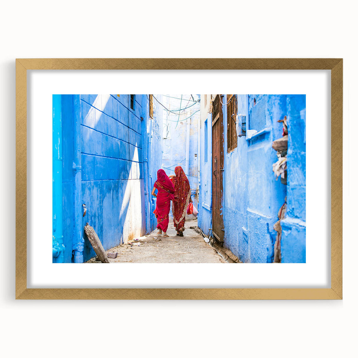 Extra large abstract art print of a textured Indian landscape in muted gold and earth tones, framed with a mat.