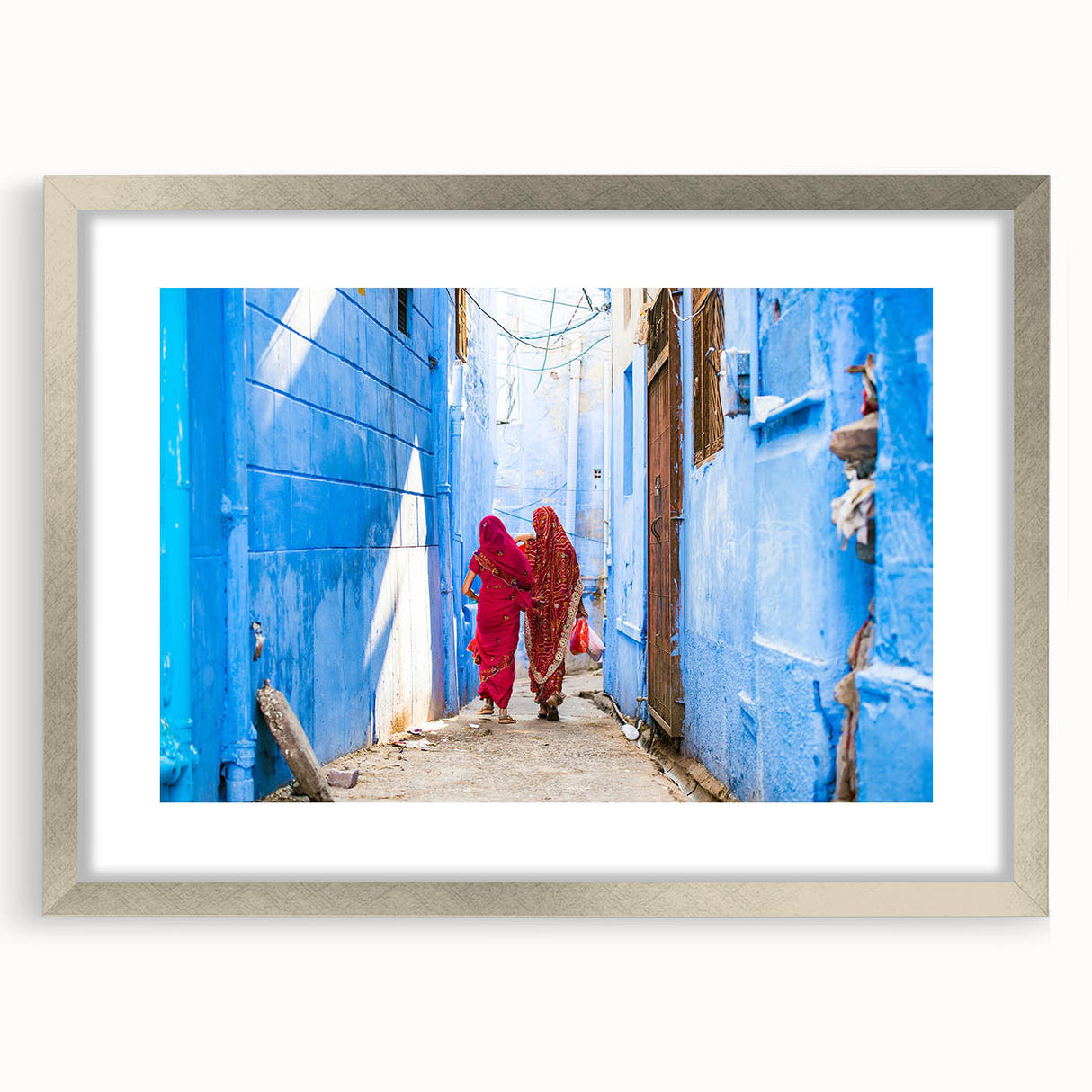 Textured abstract art print depicting a serene Indian landscape in muted earth tones, framed with a silver mat.