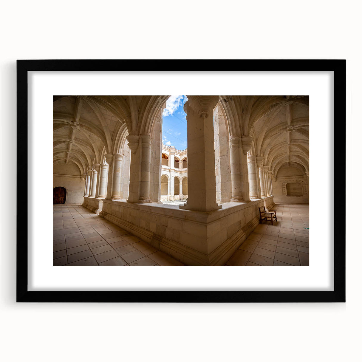 Abstract art print of Oaxaca scenery in vibrant, textured colors on a large framed canvas, ideal for living room decor.