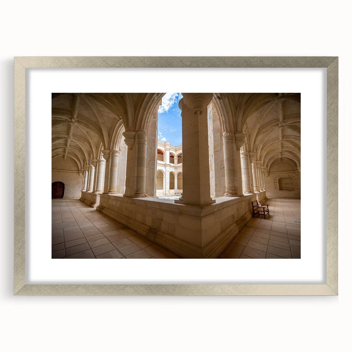 Textured abstract art print depicting a serene Mexican landscape in muted earth tones, framed in silver.