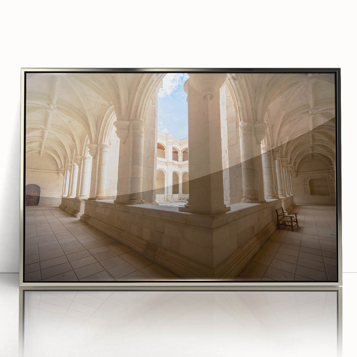 Mid-century modernist art depicting Oaxaca scenery in muted earth tones on a silver-framed acrylic.