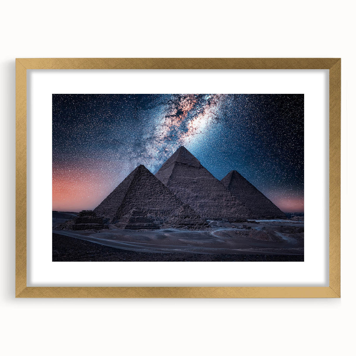 Textured abstract art print depicting a stylized Egyptian landscape in earth tones, framed with a gold mat.