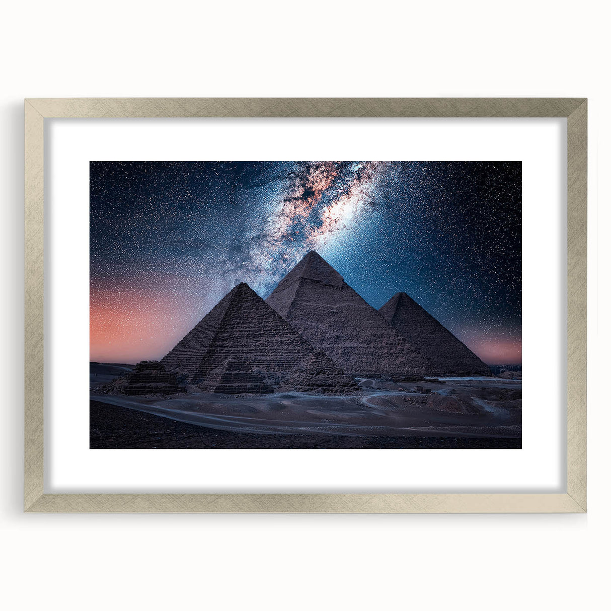 Abstract art print of Egyptian scenery in muted earth tones on a framed canvas, suitable for dining room decor.