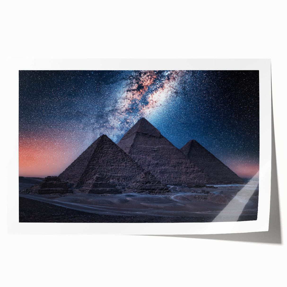 African scenery with pyramids and camels in muted earth tones on a rolled canvas, suited for dining room wall art.