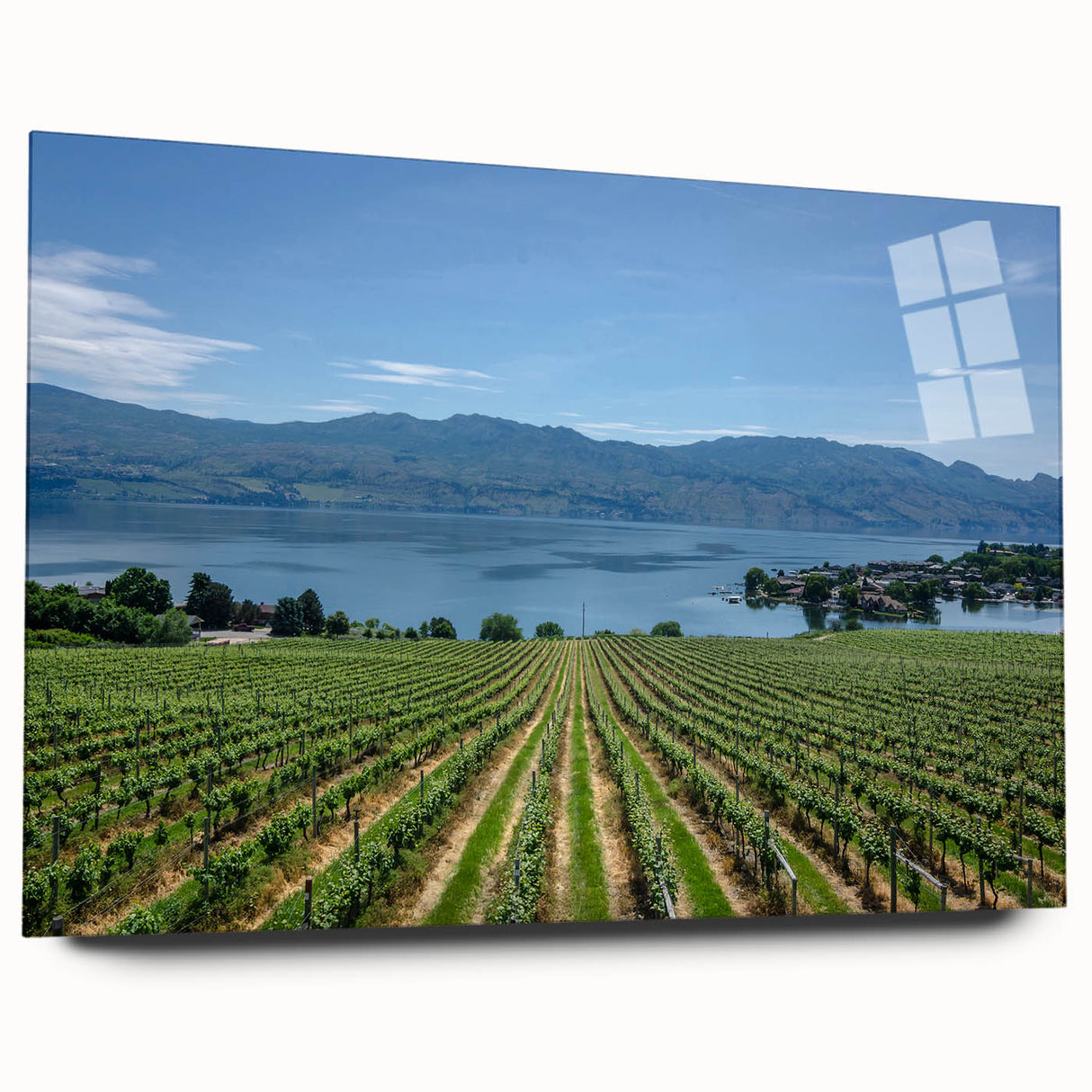 Acrylic print of a large abstract depiction of British Columbia scenery in cool blue and green tones.