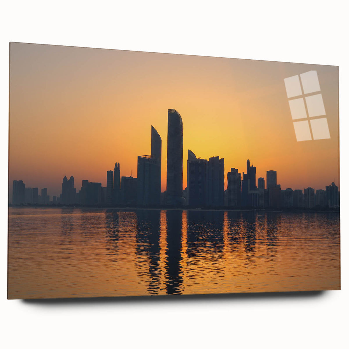 Large abstract wall art of Abu Dhabi skyline in muted blue and gray tones on acrylic glass.