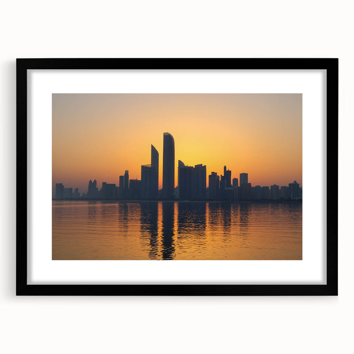 Extra large abstract art print depicting colorful, textured scenery of Abu Dhabi, framed in black.