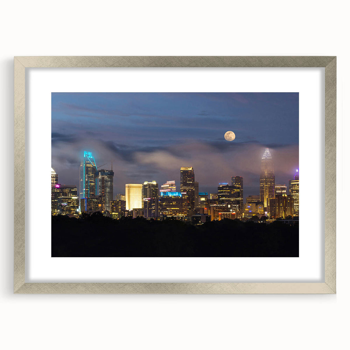 Textured art print of Charlotte skyline in muted gray and blue tones, framed in silver, ideal for bedroom wall decor.
