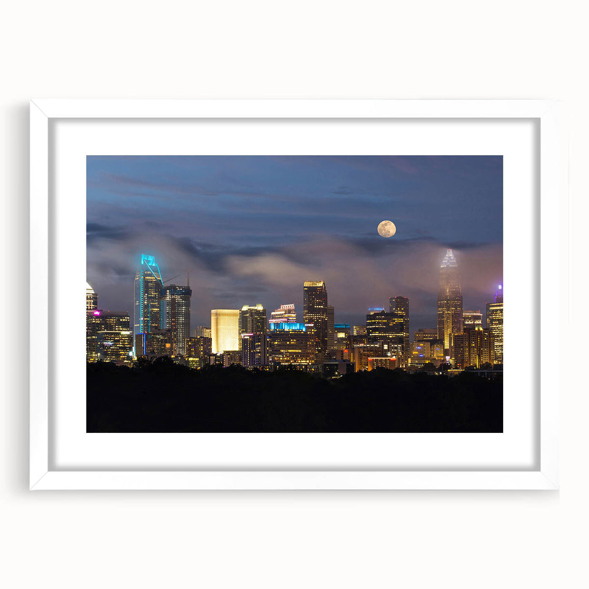 Abstract art print of Charlotte skyline in muted gray and blue tones on a framed white mat, suitable for dining room decor.