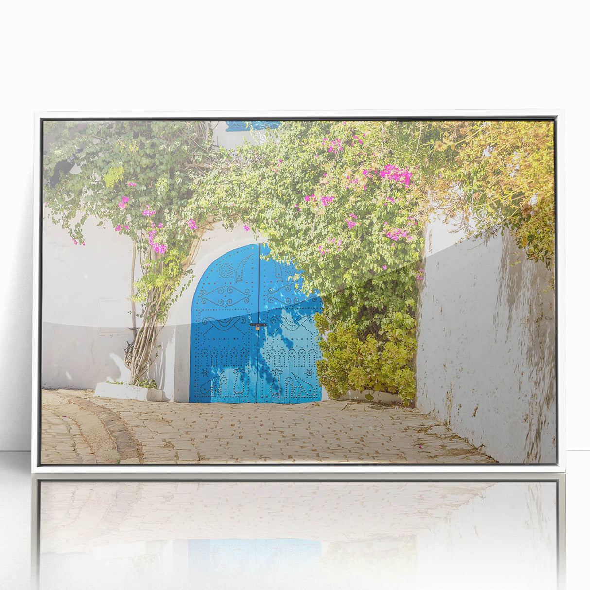 Acrylic print of a Tunisian landscape in muted earth tones, framed in white, suitable for modern art wall decor.