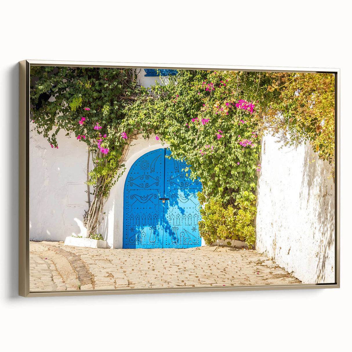Framed canvas depicting a vintage-style Tunisian landscape in muted gold and black tones, suitable for bedroom wall art.