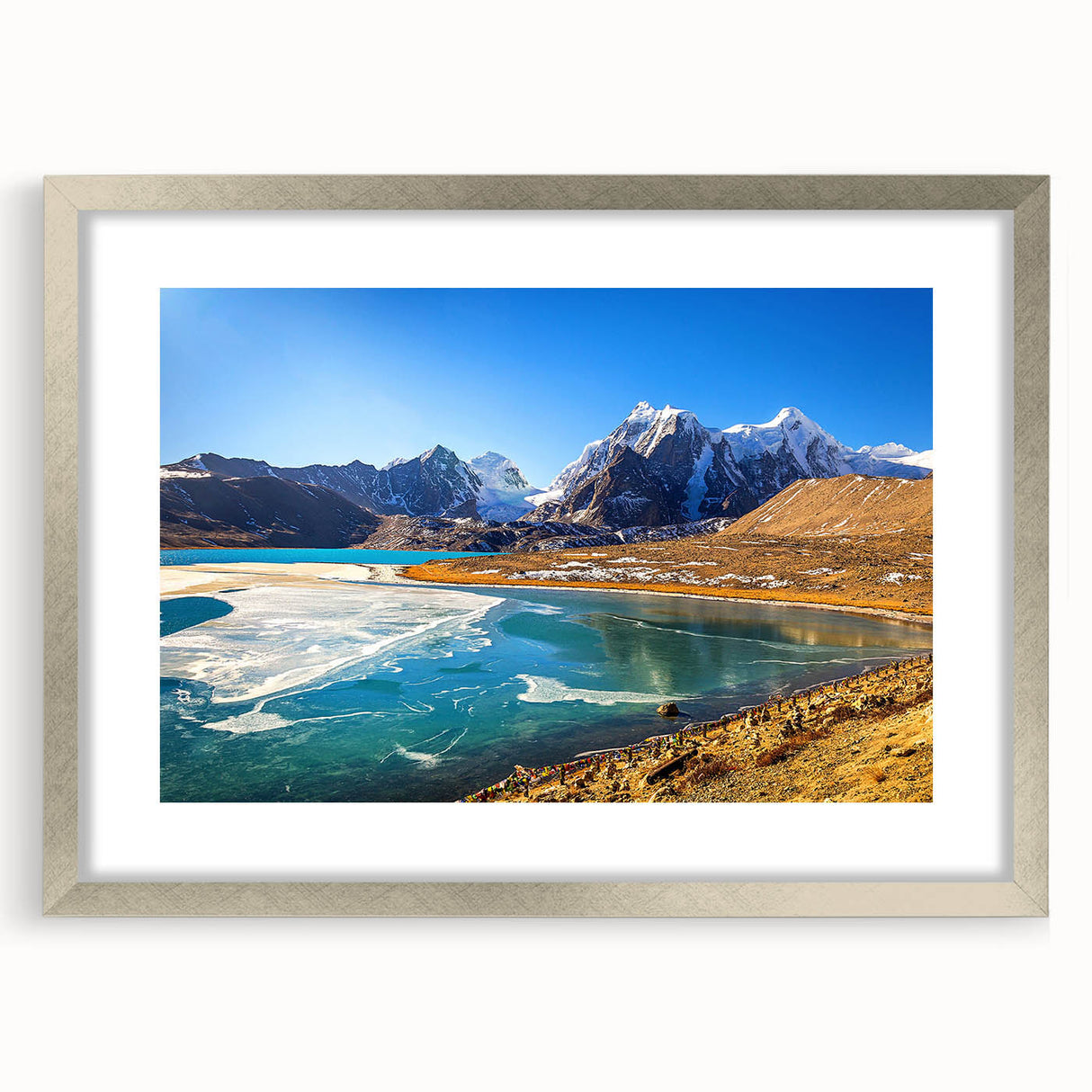 Textured abstract art print depicting a serene Indian landscape in muted earth tones, framed with a silver mat.