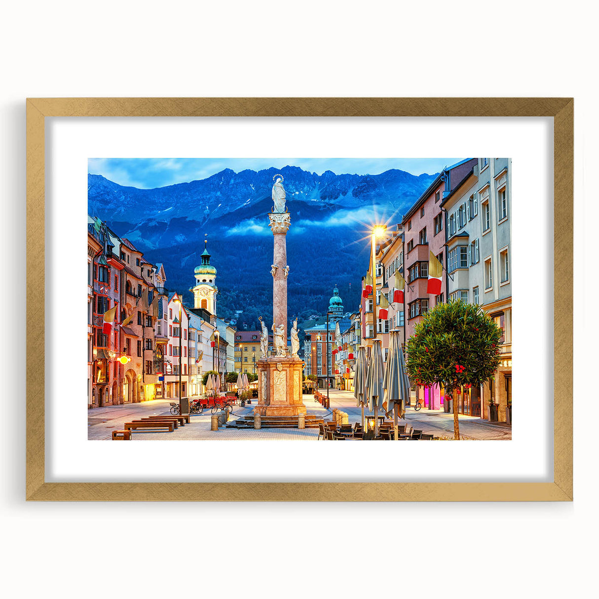 Abstract art print of a European scenery in muted earth tones, displayed in a gold frame with mat.
