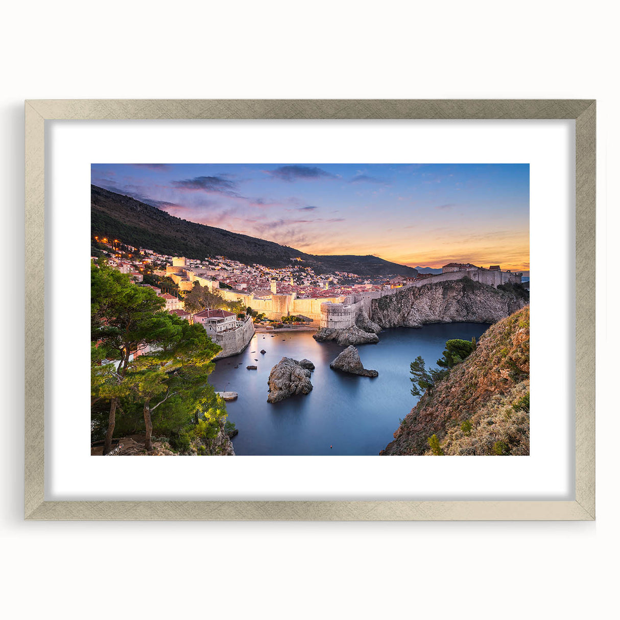 Extra large abstract art print featuring a textured European scenery in muted earth tones, framed with a silver mat.