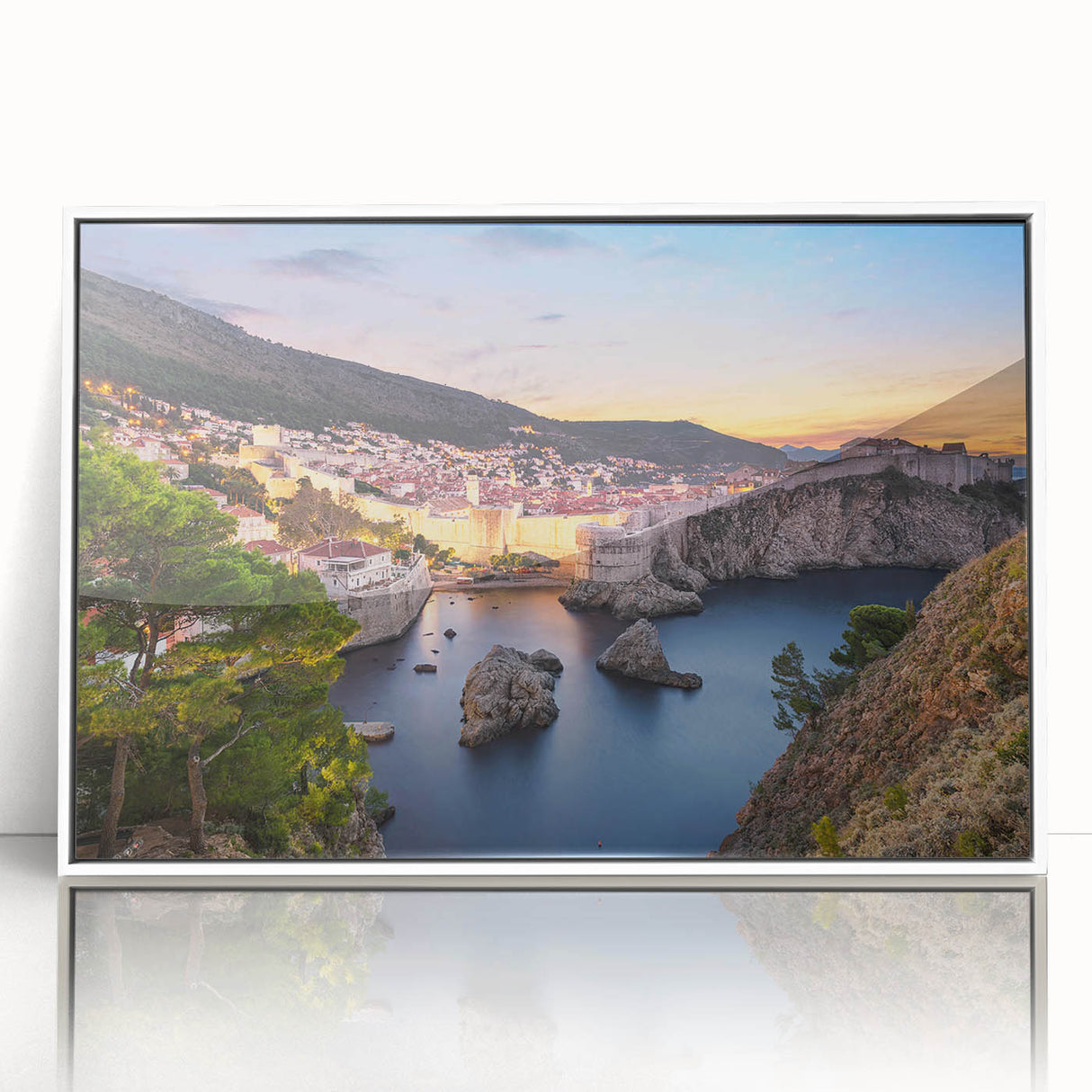 Mid-century modernist art depicting a European Croatian landscape in muted earth tones on a white framed acrylic.