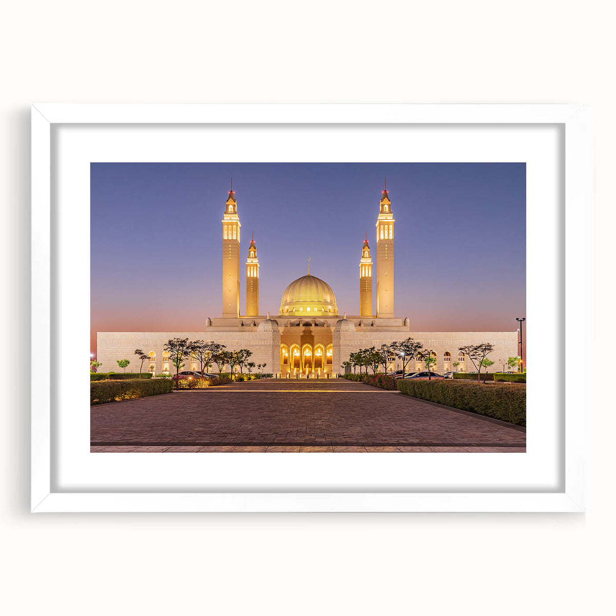 Abstract art print depicting Middle Eastern scenery in muted earth tones on a white matted frame.