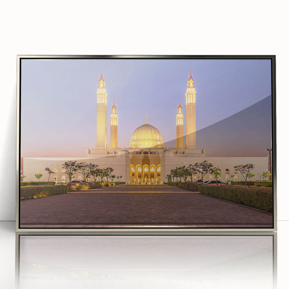 Mid-century modernist art depicting a serene Oman landscape in muted earth tones on a silver-framed acrylic print.