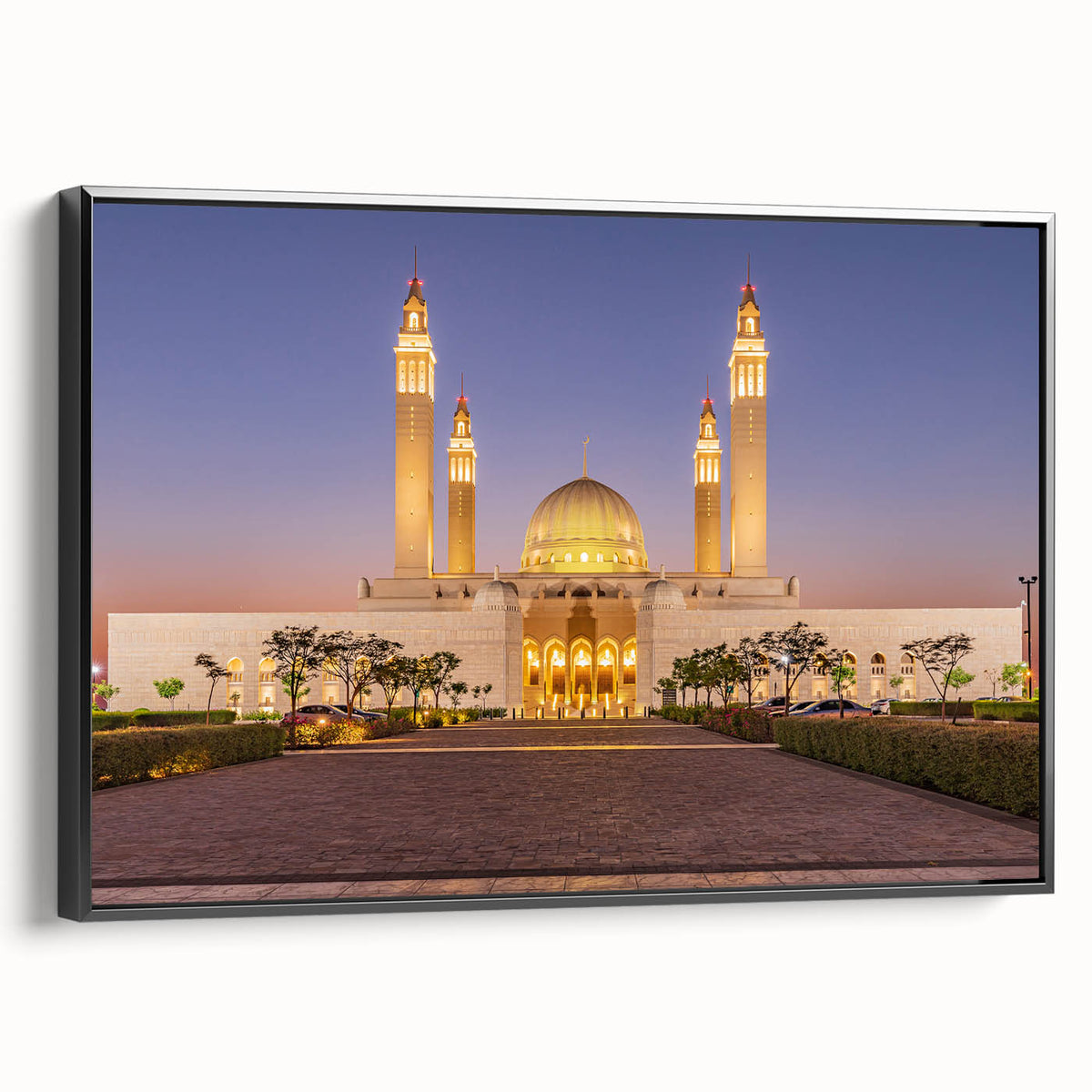 Black and white framed canvas featuring a vintage landscape painting of Oman, ideal for bedroom decor.