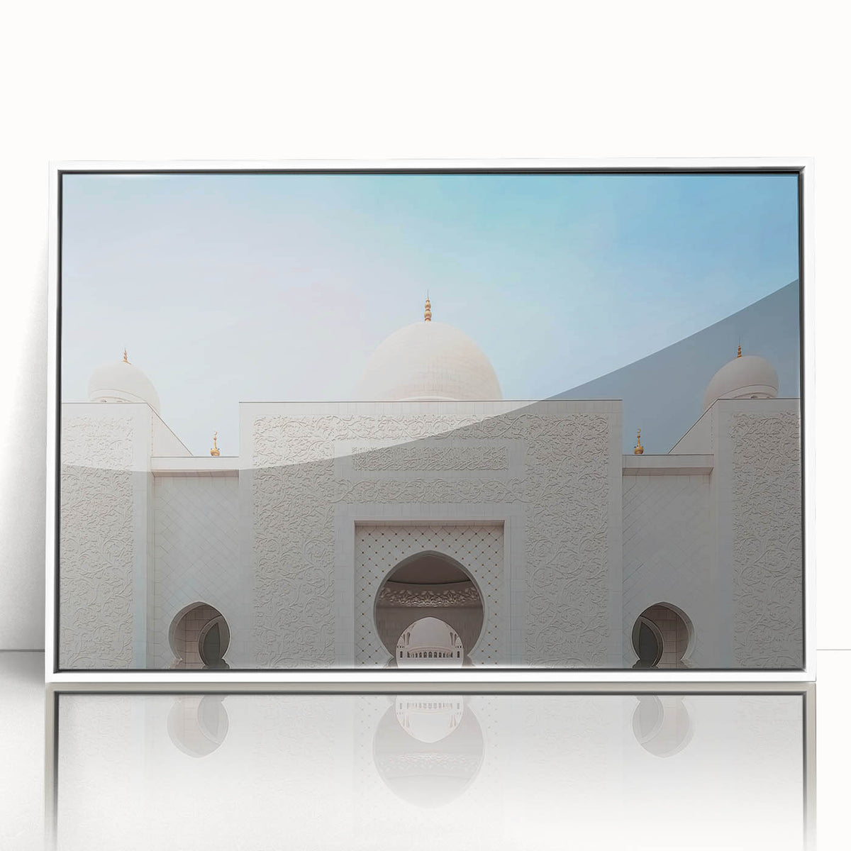 Modern art wall decor featuring a minimalist Abu Dhabi skyline in muted blues and grays on a white acrylic frame.