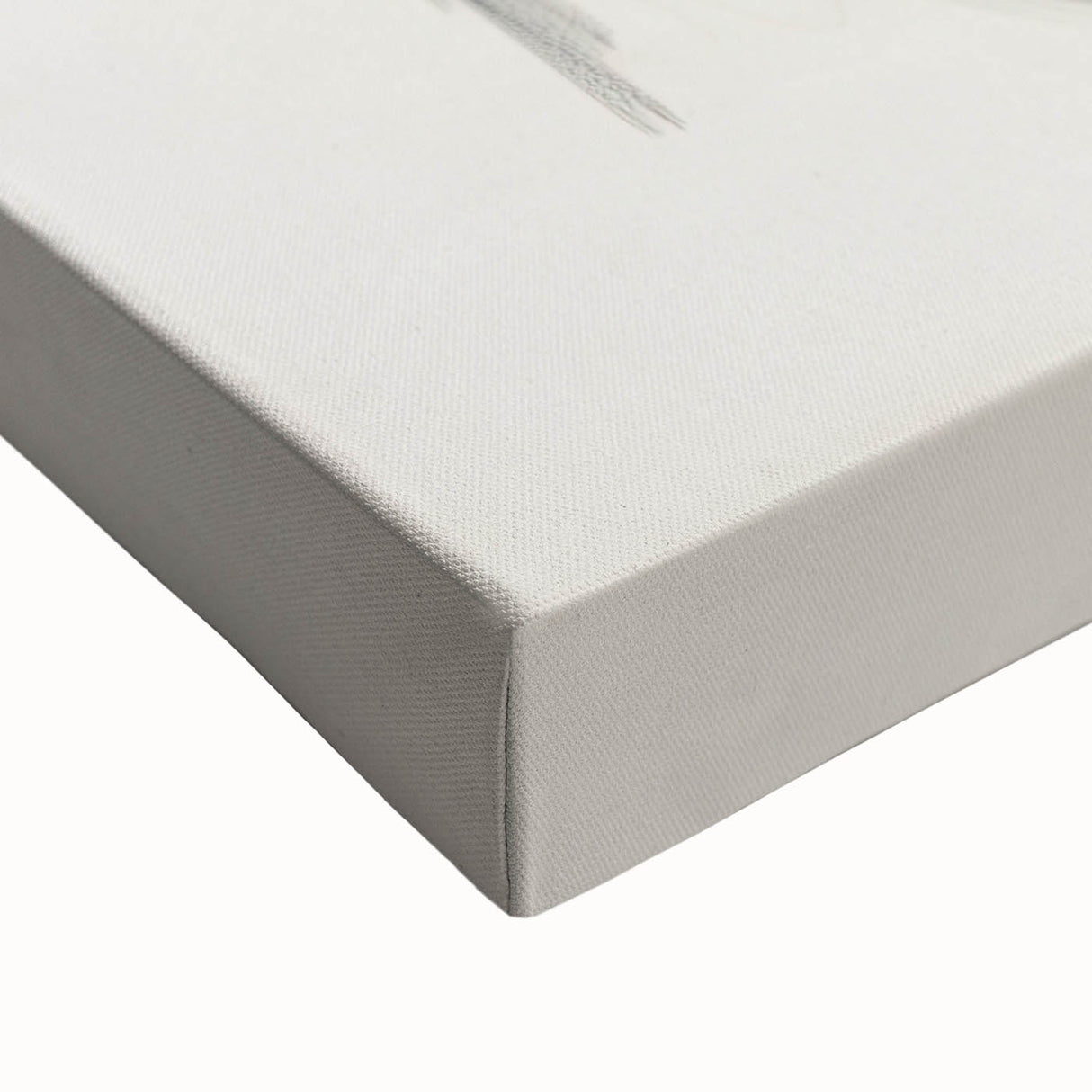 Close-up of a stretched canvas showcasing abstract minimalist wall art, featuring soft earth tones and geometric shapes, ideal for modern home decor.