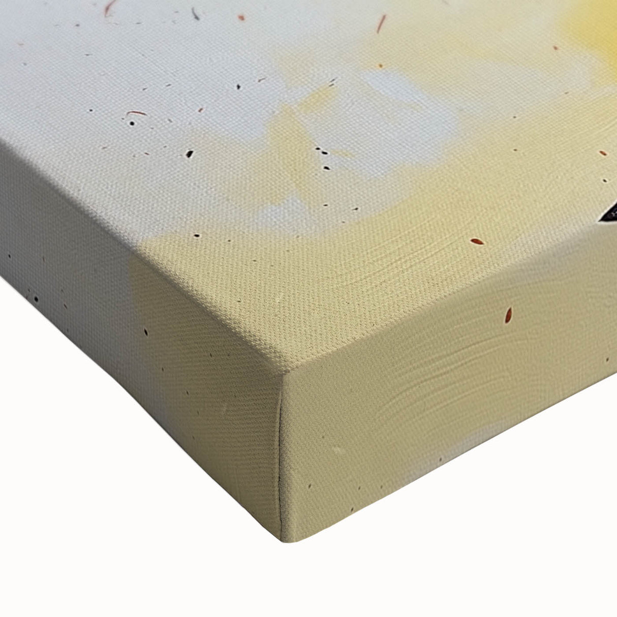 Close-up of a stretched canvas featuring vibrant abstract floral designs in shades of blue, pink, and gold, ideal for modern home decor and art enthusiasts.