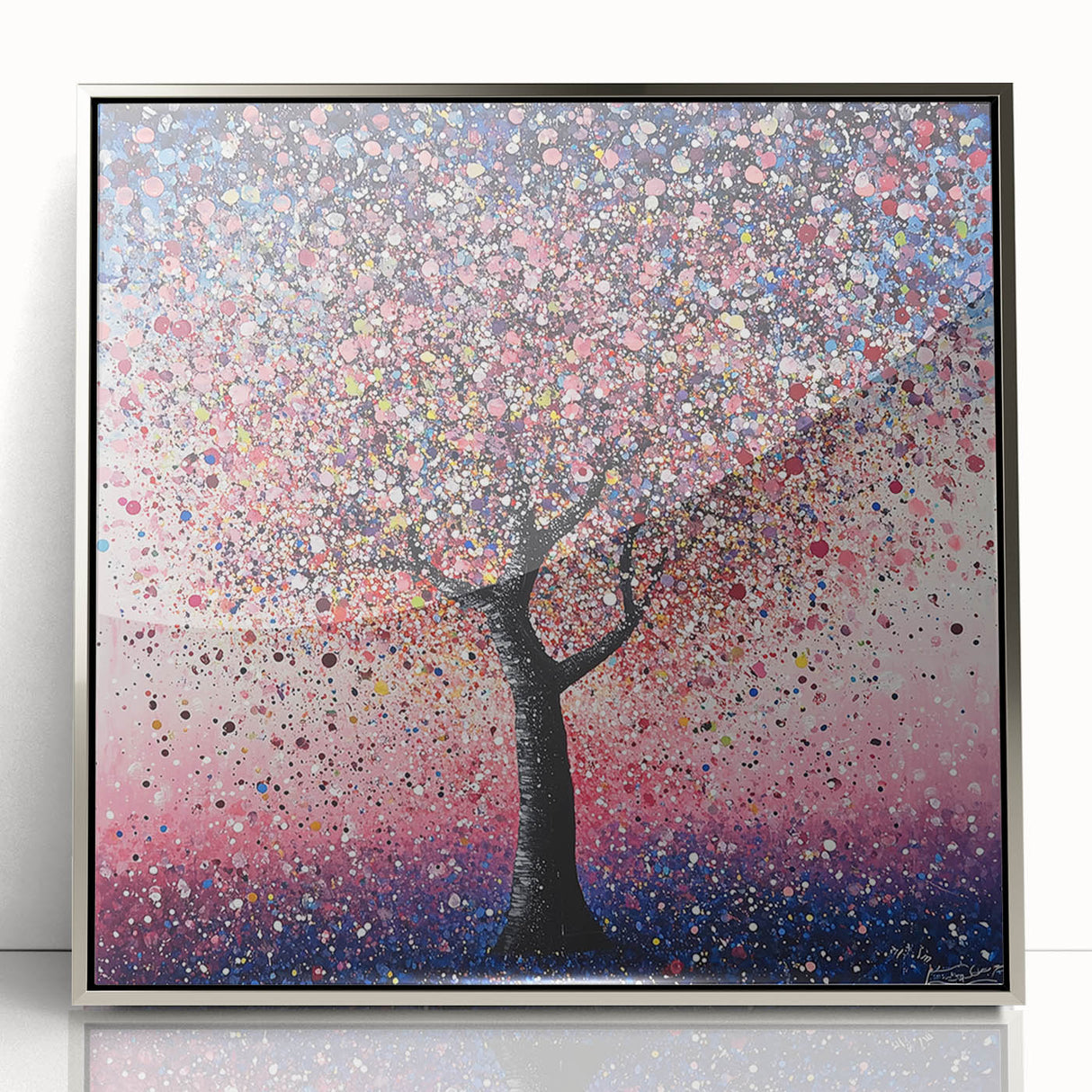 Framed acrylic artwork showcasing abstract floral designs in vibrant colors, elegantly bordered with a sleek silver frame, perfect for modern decor.