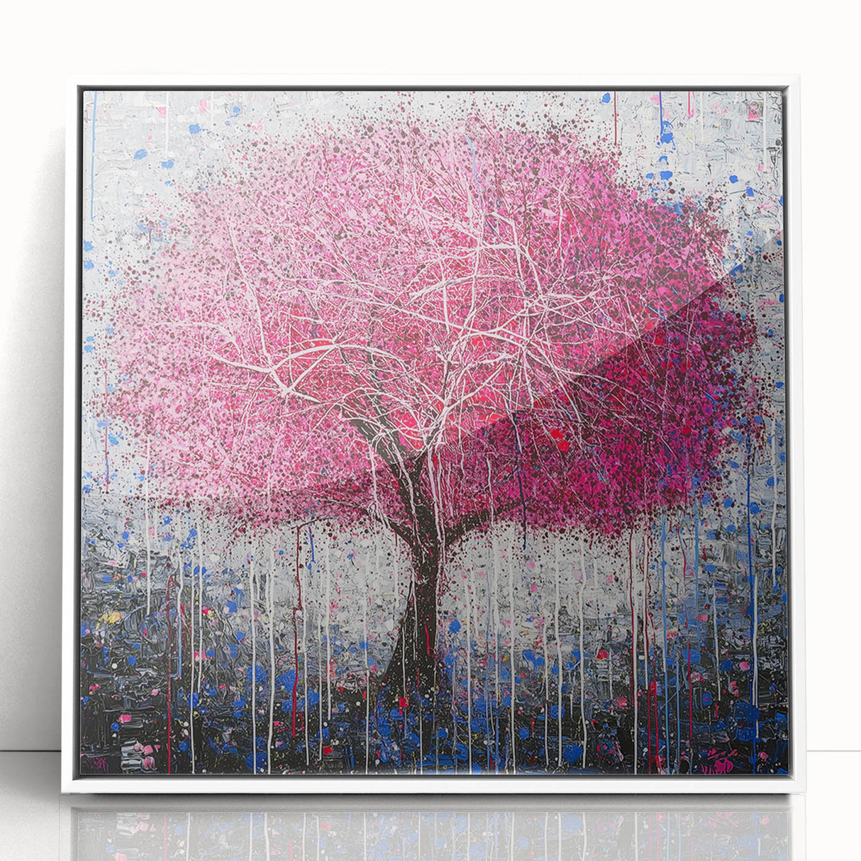 Framed acrylic artwork showcasing an abstract floral design in vibrant colors, set against a sleek white background, perfect for modern home decor.