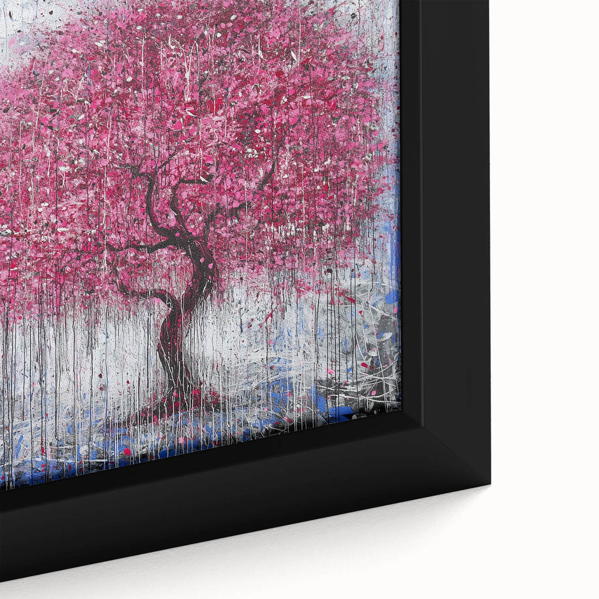 Close-up of an abstract floral framed canvas art piece showcasing vibrant colors of pink, green, and gold, perfect for modern home decor accents.