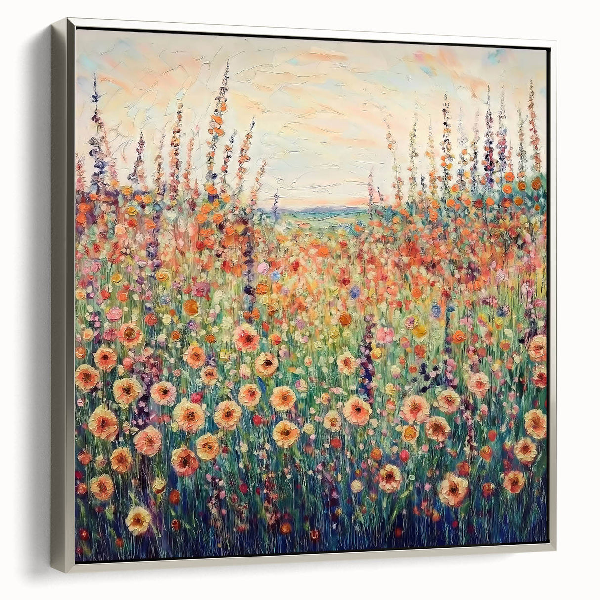 Framed canvas artwork showcasing an abstract floral design with vibrant colors, elegantly displayed in a sleek silver frame, perfect for modern decor.