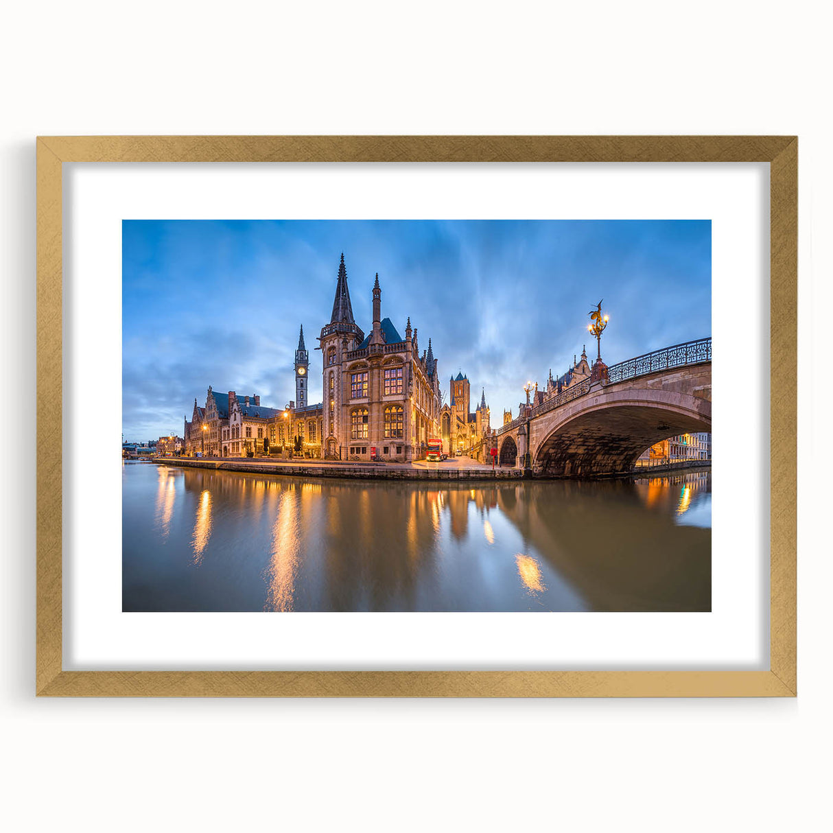 Abstract art print of a European scenery in muted gold and green tones, framed with a gold mat.