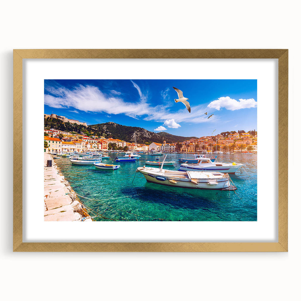 Abstract art print of a Croatian landscape in muted earth tones, framed in gold, suitable for dining room decor.