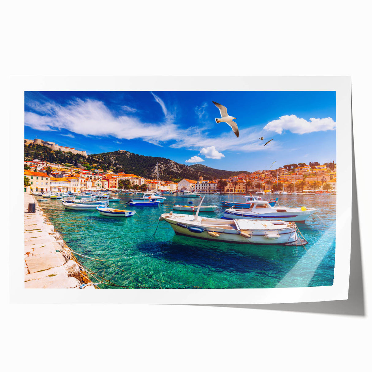 Rolled print of a Croatian landscape with vibrant green and blue tones, ideal for dining room wall art.
