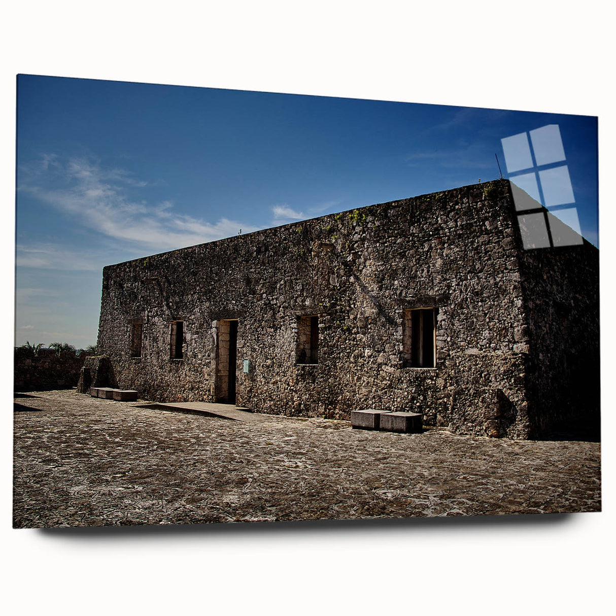 Large abstract wall art depicting Quintana Roo scenery in muted blue and green tones on acrylic glass.