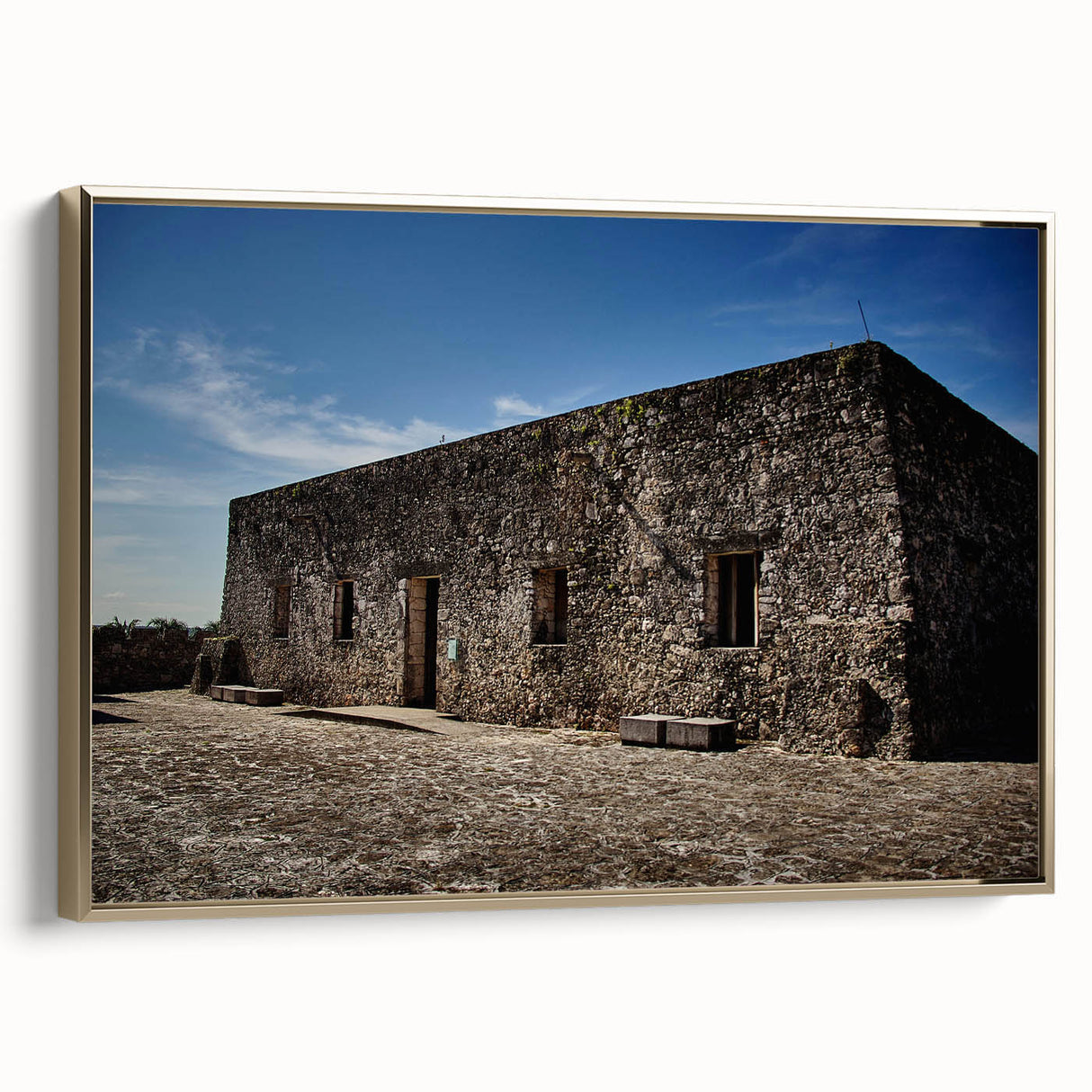 Framed canvas featuring a vintage-style landscape painting of Quintana Roo, Mexico, with muted earth tones.