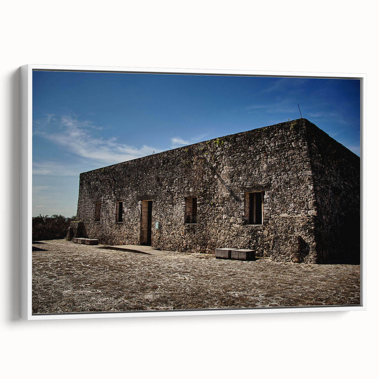 Vintage poster art of Quintana Roo scenery on framed canvas, featuring vibrant colors against a black background.