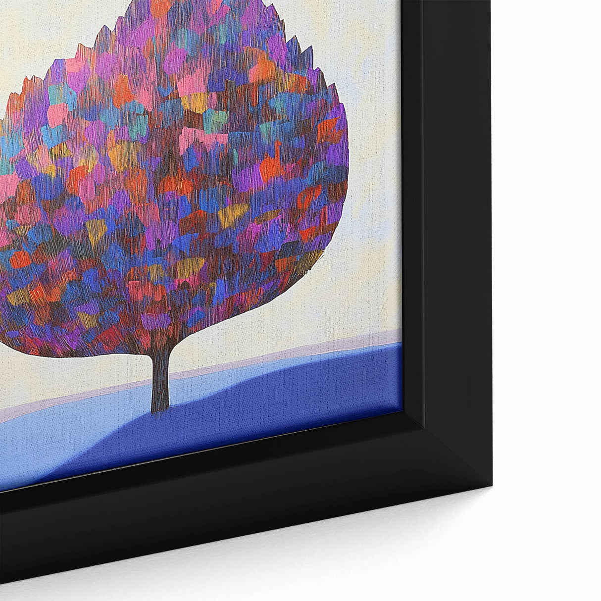 Close-up of a vibrant abstract floral framed canvas showcasing intricate details in bold colors like pink, blue, and yellow, perfect for modern home decor.