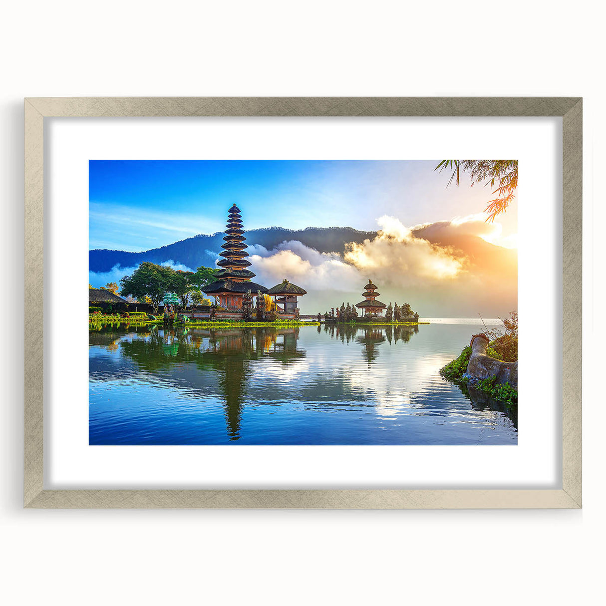 Textured abstract art print depicting a serene Indonesian landscape in muted earth tones, framed in silver.