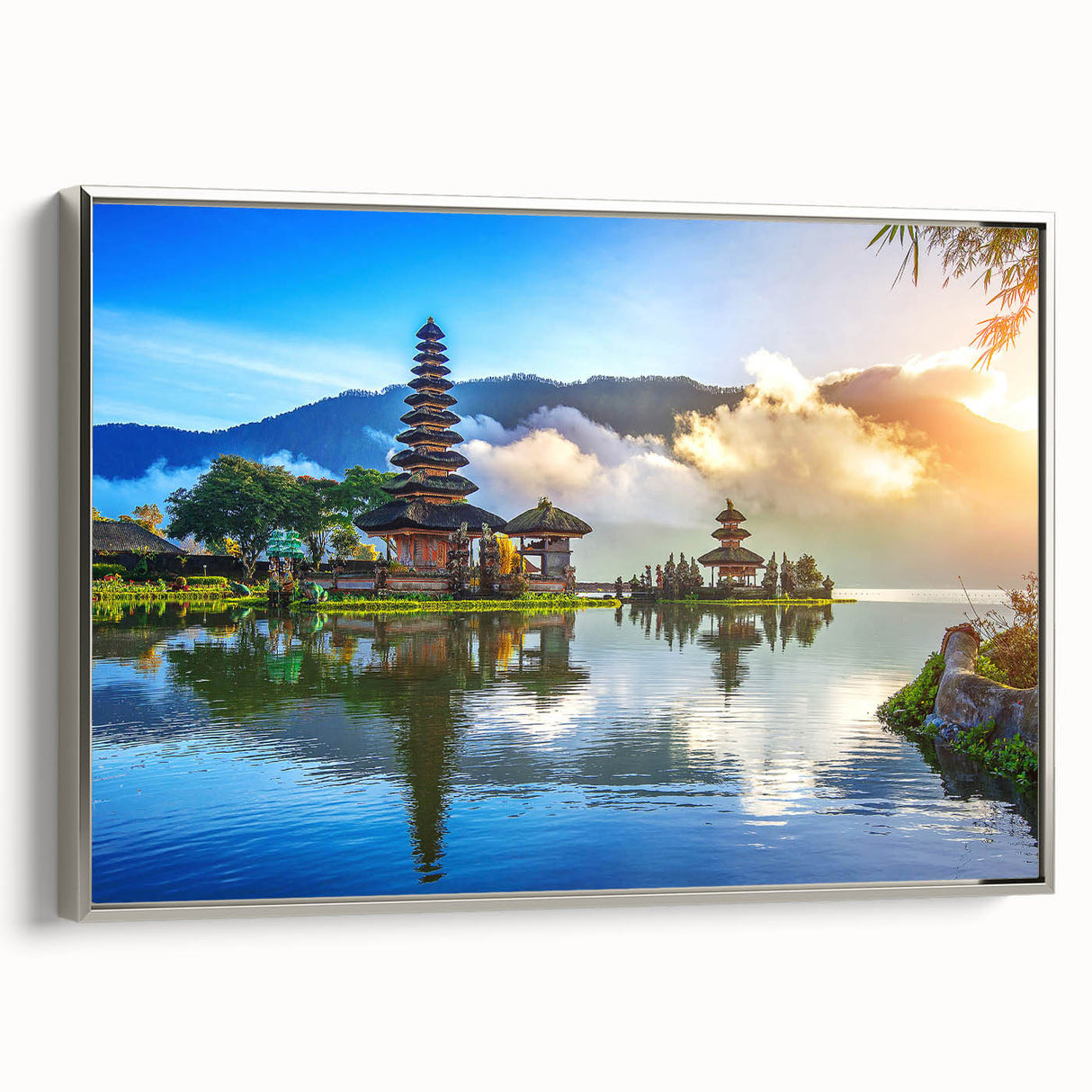 Landscape art painting of a serene Indonesian scenery in vibrant colors on a silver-framed canvas.