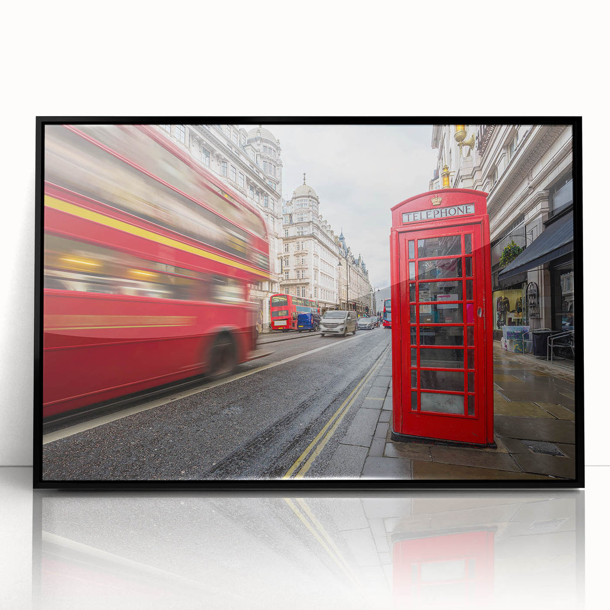 Large abstract wall art depicting the London skyline in muted gray and blue tones, framed in black acrylic.