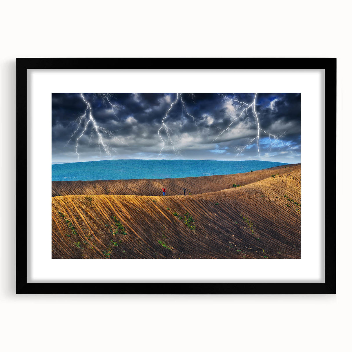 Colorful abstract art print of a European landscape on a large textured canvas, framed in black, ideal for living room decor.