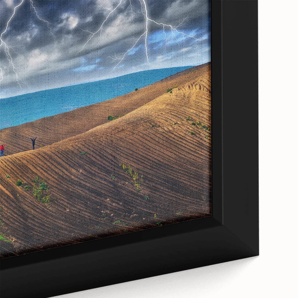 Black wall art depicting a textured, colorful European scenery on a large framed canvas, suitable for living room decor.