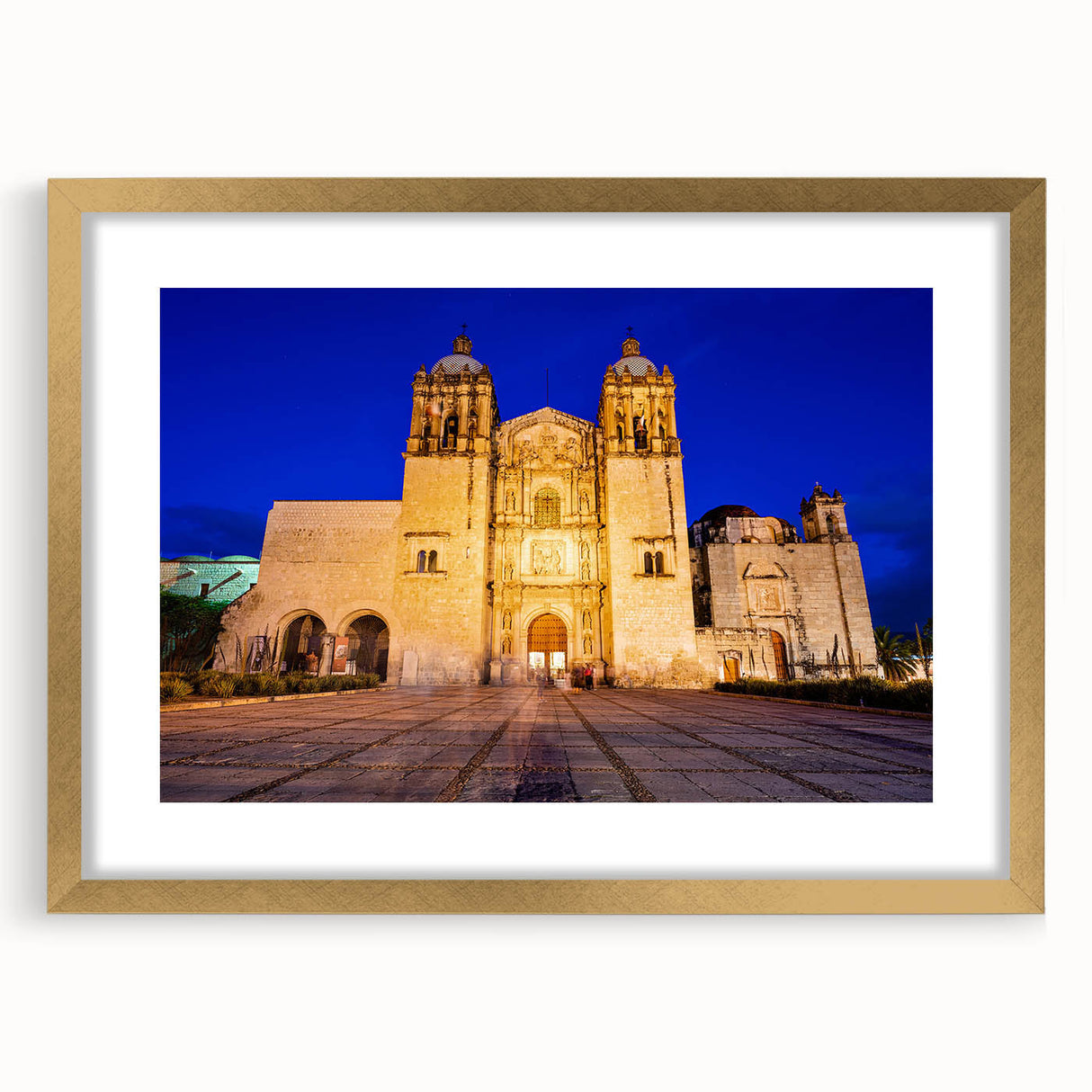 Extra large abstract art print of a textured scenery in Oaxaca, featuring earthy tones on a gold-framed canvas.