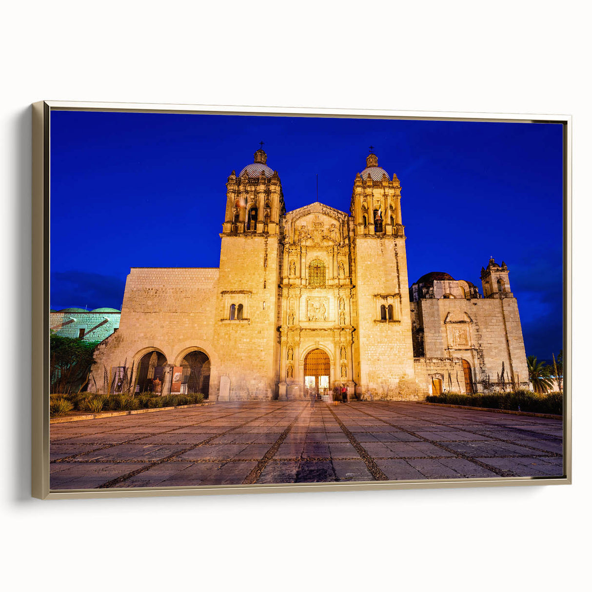 Framed canvas depicting a vintage-style landscape painting of Oaxaca, Mexico, in black and gold tones.