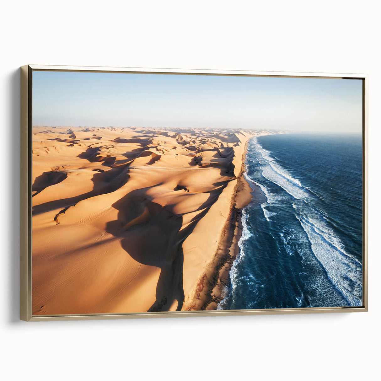 Framed canvas featuring a landscape art painting of the Namibian desert with vibrant sunset colors.